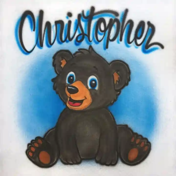 Cute airbrushed illustration of a cartoon bear. The word 'Christopher' is written in black cursive with a blue faded background, above a smiling black bear with blue eyes and tan accents, set against a light blue circular background.