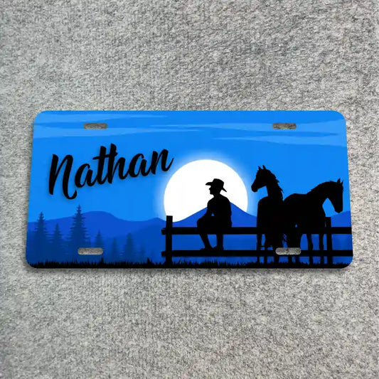 Cowboy on fence with horses License Plate CLP_278b